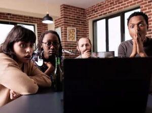A bunch of frustrated people sitting around a table in a business meeting